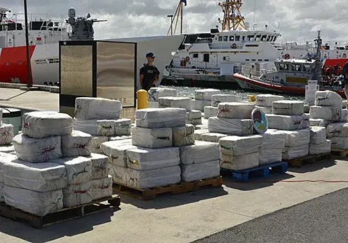 The Coast Guard offloaded approximately 4.2 tons of seized cocaine, worth an estimated $125 million in wholesale value, at Coast Guard Sector San Juan.  (Photo courtesy of DEA)