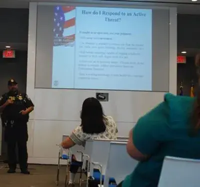 An FPS officer presenting shooter procedures to employees at the Food and Drug Administration.