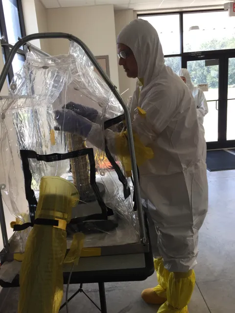 Simulated nuclear fallout debris is prepared for shipment to national labs for forensic analysis.