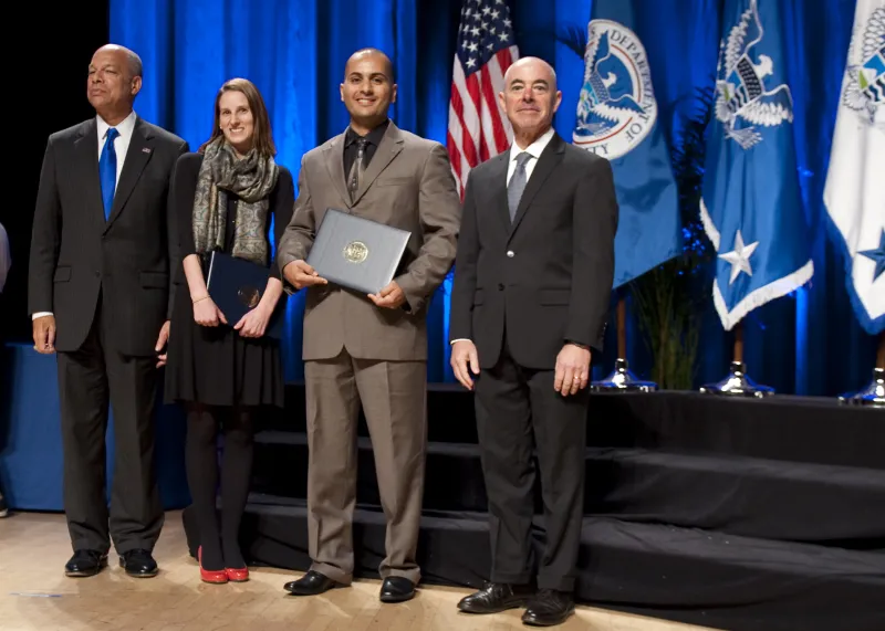 Secretary of Homeland Security Jeh Johnson and Deputy Secretary of Homeland Security Alejandro Mayorkas presented the Secretary's Unity of Effort Award to the U.S. Citizenship and Immigration Services, Office of Intelligence and Analysis and Science and Technology Directorate's Vermont Avenue Team