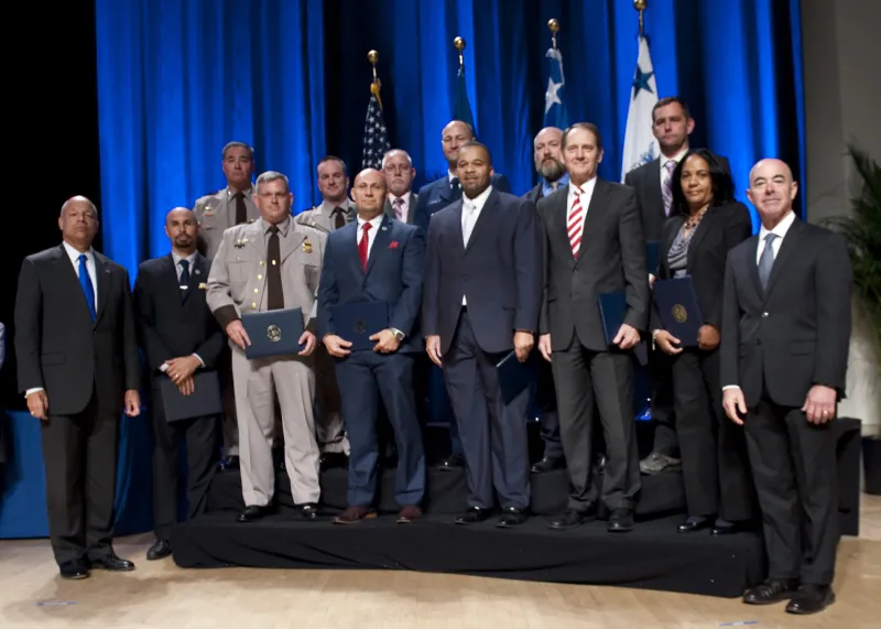 Secretary of Homeland Security Jeh Johnson and Deputy Secretary of Homeland Security Alejandro Mayorkas presented the Secretary's Unity of Effort Award to the Special Programs Section/Air Relocation Program comprised of the Office of Operations Coordination, U.S. Customs and Border Protection, U.S. Coast Guard, Federal Emergency Management Agency, Management Directorate and the National Protection and Programs Directorate