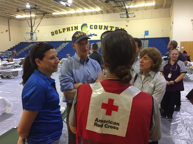 Acting Secretary Elaine Duke, along with Governor Rick Scott and Red Cross President and CEO Gail McGovern, tour a Red Cross shelter at Marathon High School.