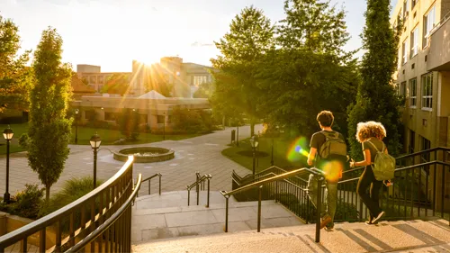 University campus with students walking.