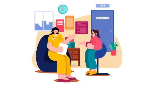 Two women discussing ideas inside of an office