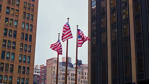 3 American flags downtown.