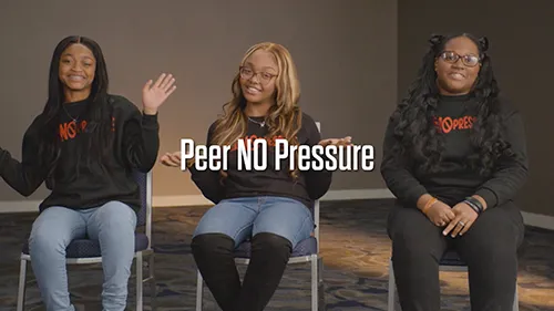 3 young women saying Peer No Pressue.