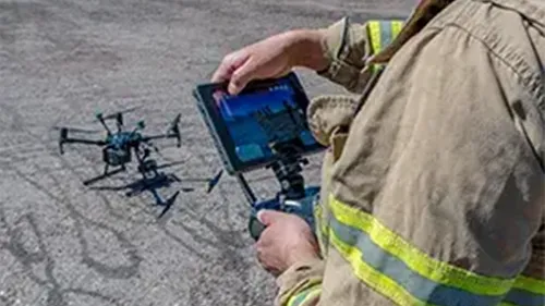 Responder operating a drone