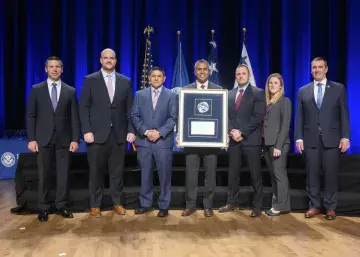Caption: <p>WASHINGTON (Nov. 6, 2019) Acting Homeland Security Secretary Kevin McAleenan and Acting Deputy DHS Secretary David Pekoski present the Unit Award to the Innovation Task Force at the 2019 Secretary’s Award Ceremony at the Daughters of the American Revolution Constitution Hall. (DHS Photo by Tim D. Godbee/Released)</p>