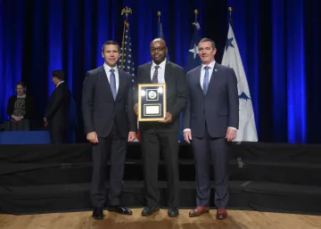 Caption: <p>WASHINGTON (Nov. 6, 2019) Acting Homeland Security Secretary Kevin McAleenan and Acting Deputy DHS Secretary David Pekoski present the Leadership Excellence Award to Willie Nunn at the 2019 Secretary’s Award Ceremony at the Daughters of the American Revolution Constitution Hall. (DHS Photo by Tim D. Godbee/Released)</p>
