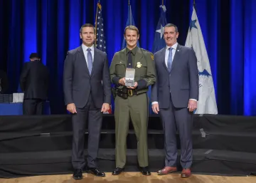 Caption: <p>WASHINGTON (Nov. 6, 2019) Acting Homeland Security Secretary Kevin McAleenan and Acting Deputy DHS Secretary David Pekoski present the Meritorious Service Silver Medal to Matthew L. Volkening at the 2019 Secretary’s Award Ceremony at the Daughters of the American Revolution Constitution Hall. (DHS Photo by Tim D. Godbee/Released)</p>