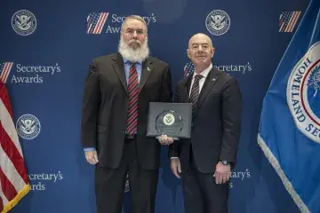 Innovation Award recipient Gunnar Pedersen (left) with DHS Secretary Alejandro Mayorkas (right).