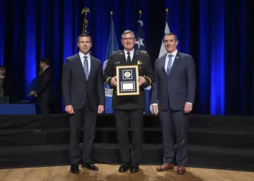 Caption: <p>WASHINGTON (Nov. 6, 2019) Acting Homeland Security Secretary Kevin McAleenan and Acting Deputy DHS Secretary David Pekoski present the Leadership Excellence Award to Thomas J. Sullivan at the 2019 Secretary’s Award Ceremony at the Daughters of the American Revolution Constitution Hall. (DHS Photo by Tim D. Godbee/Released)</p>