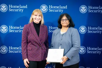 Acting DHS Deputy Secretary Kristie Canegallo with Innovation Award recipient, Kalpana Reddy.
