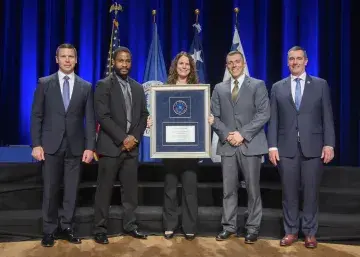 Caption: <p>WASHINGTON (Nov. 6, 2019) Acting Homeland Security Secretary Kevin McAleenan and Acting Deputy DHS Secretary David Pekoski present the Unit Award to the Region III — Substantial Damage Determination Team at the 2019 Secretary’s Award Ceremony at the Daughters of the American Revolution Constitution Hall. (DHS Photo by Tim D. Godbee/Released)</p>