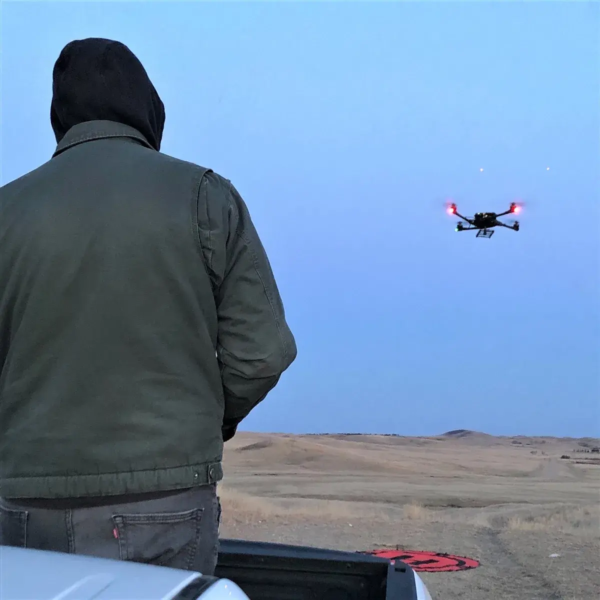 An Unmanned Aircraft System pilot simulates an evening surveillance flight with an Alta X drone.