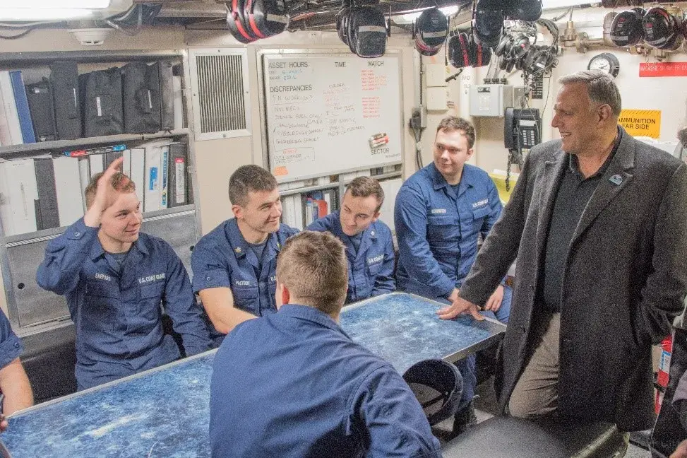 Mr. Bryan met with the crew of the Coast Guard Cutter Mustang in Whittier, Alaska. He learned about the operational challenges posed by communication limitations in the Arctic. 