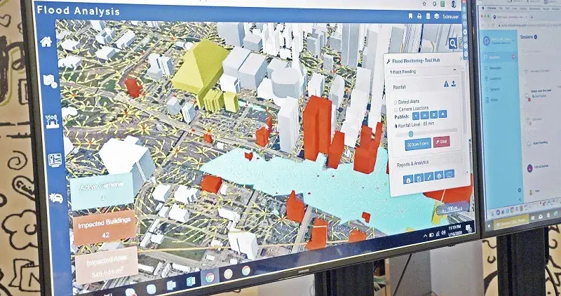 During the SCIRA exercise, a 3D flood analysis model shows city flooding.